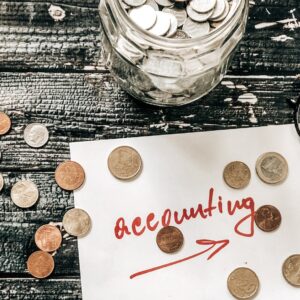 Accounting euro coins on table