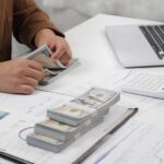 Businesswoman accounting counting money